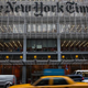 Traffic moves past the New York Times building in New York City Oct. 1, 2014.
Andrew Burton/Getty Images